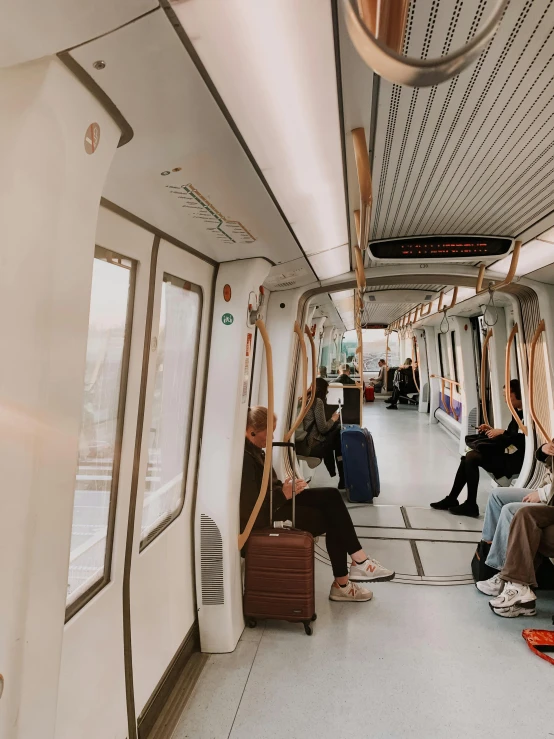 people sit in and out of public transportation