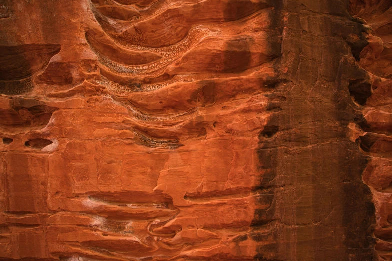an aerial view of the texture of an ancient rock formation