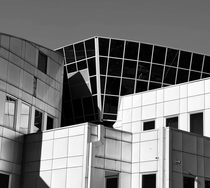 black and white image of an abstractly shaped building