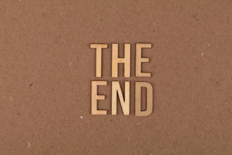 a piece of wood that says the end and cut out