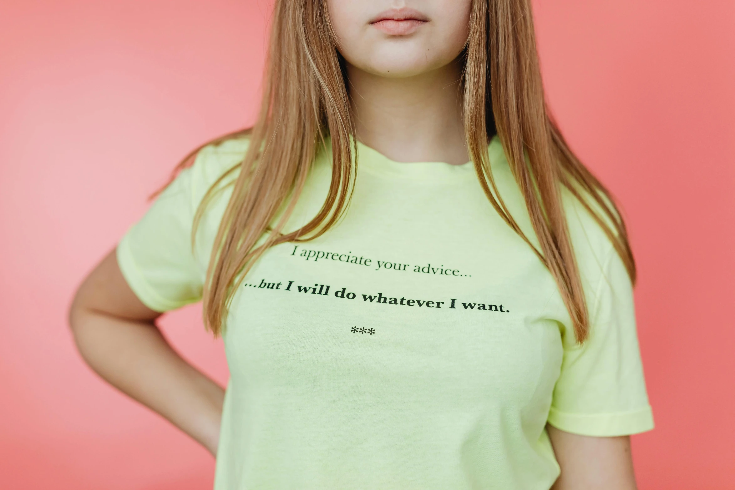 a young woman wearing a yellow shirt with the phrase sometimes you're