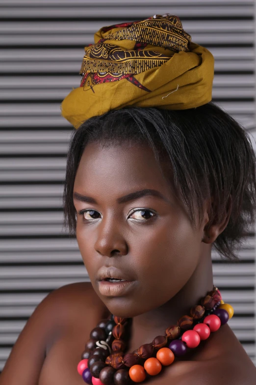 a women with a yellow hat on top of her head