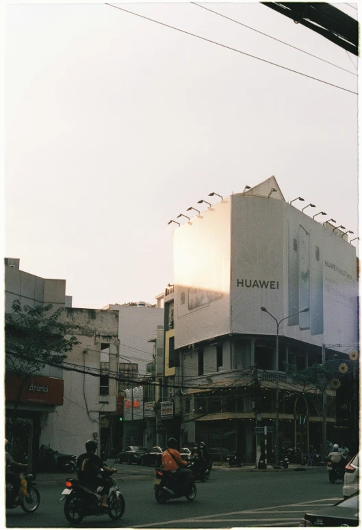 a busy street with some shops on either side