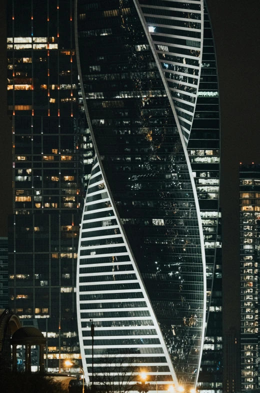 an image of a very tall building with lights