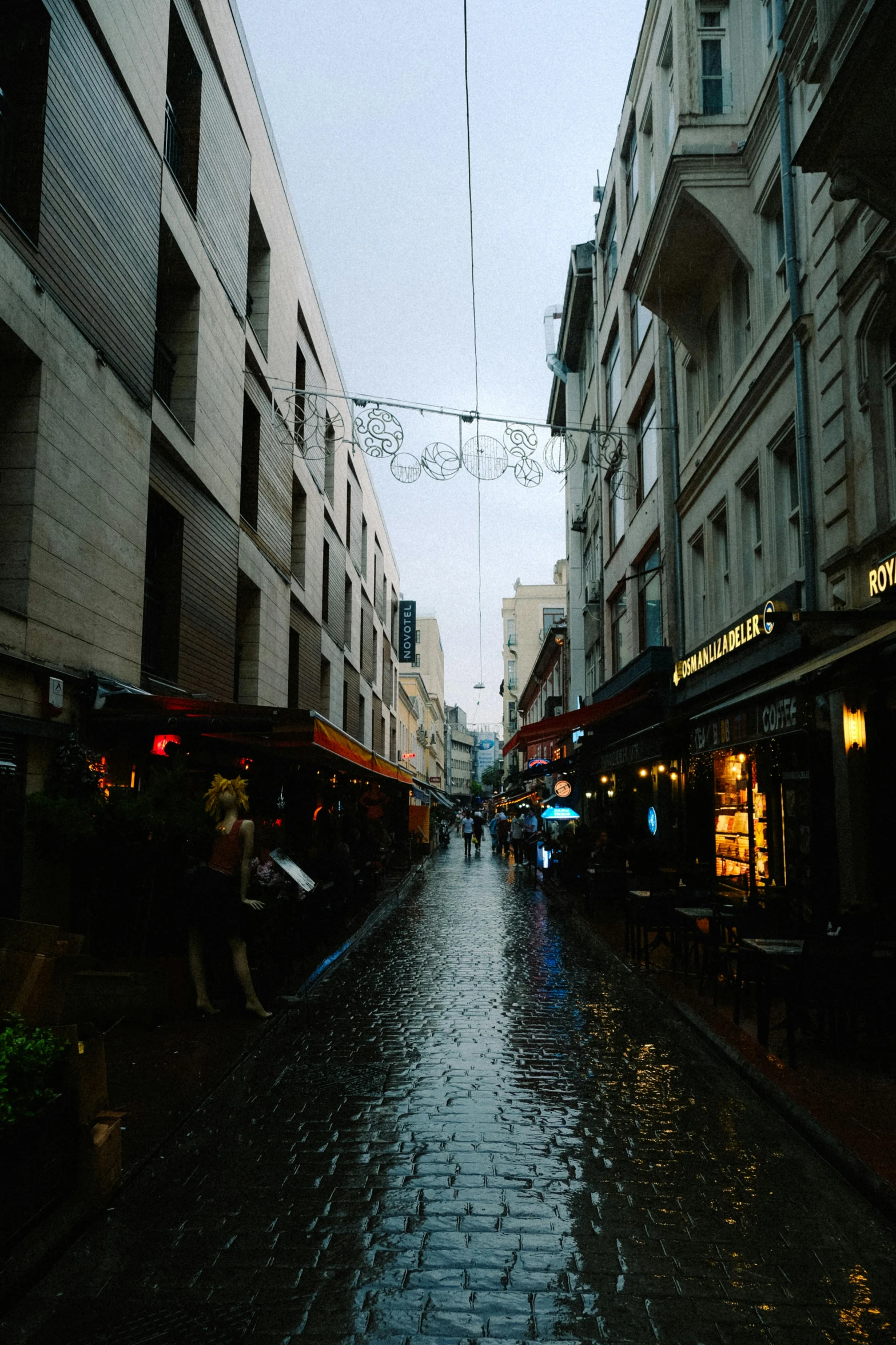 a view of a street as it rains