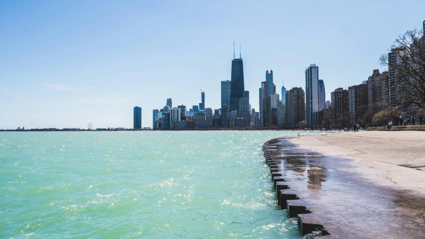 a city view of skyscrs and lake michigan