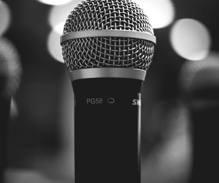 a microphone that is placed in a black and white po