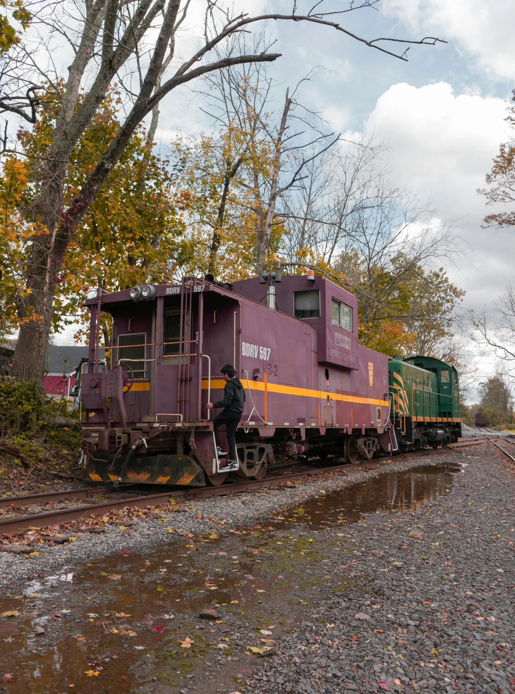 a person on the side of a train track