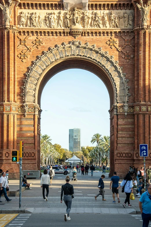 an arched brick archway has been painted gold