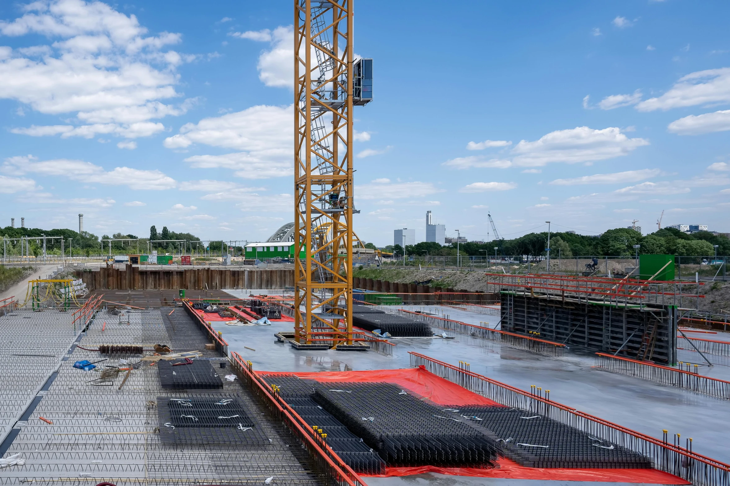 a crane is in the middle of the construction site