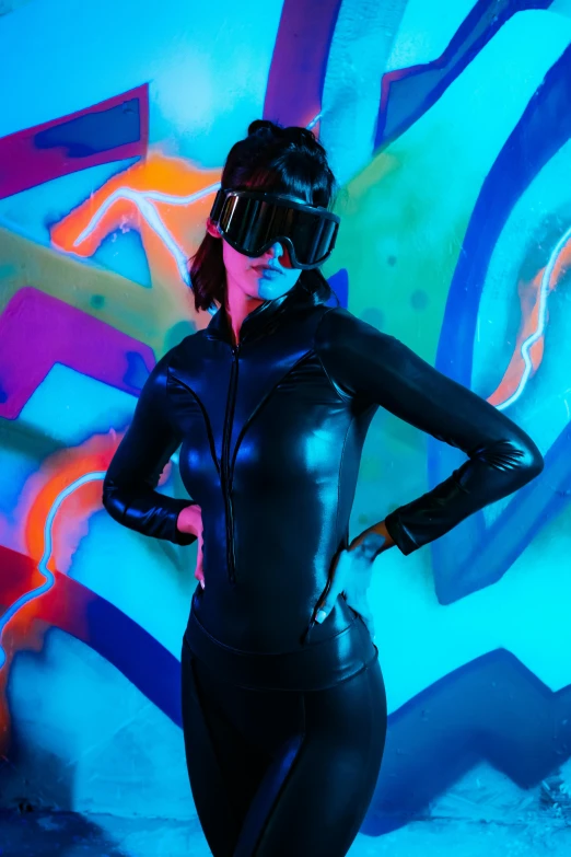 a female in a leather suit and goggles
