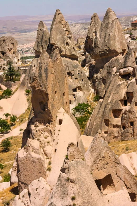 a group of rock formations sitting in the desert