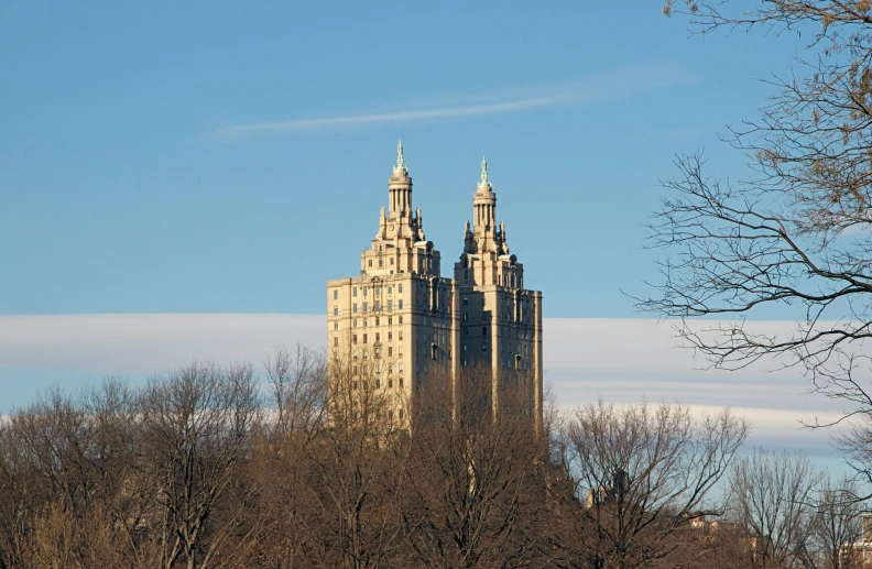 a very tall building with spires high up in the sky