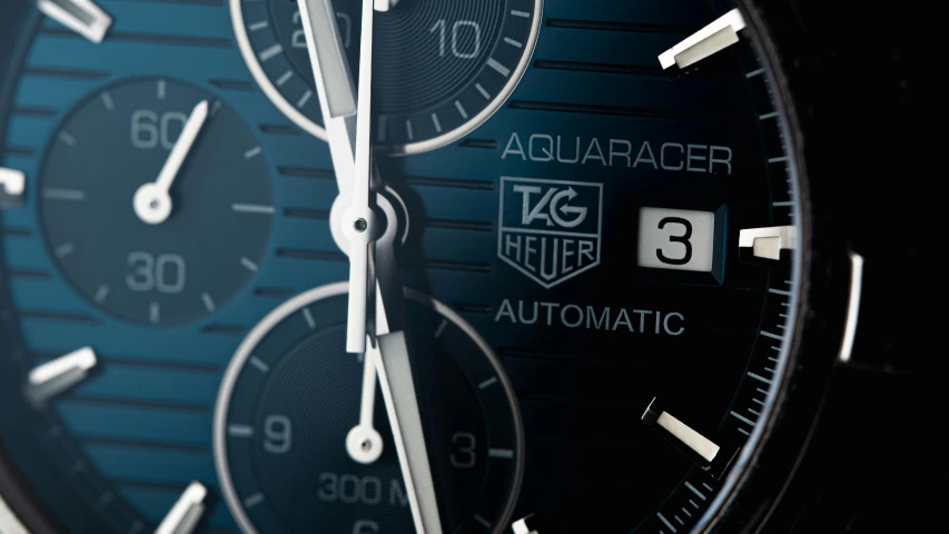a close up s of an aqua blue watch