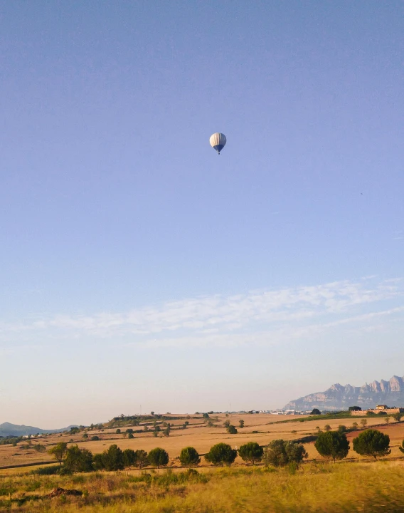 a  air balloon that is flying in the sky