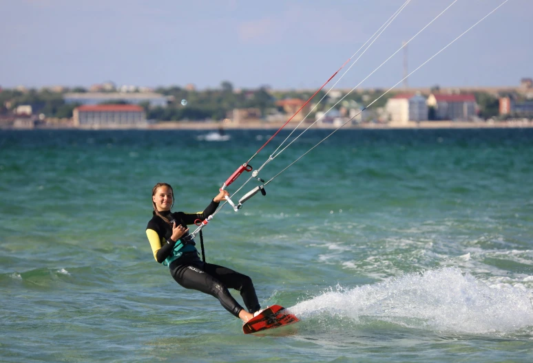 the man is riding on a surf board in the water