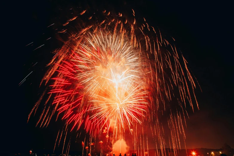 fireworks exploding up in the sky at night