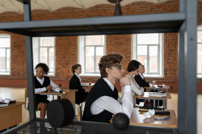 a room full of students in business wear