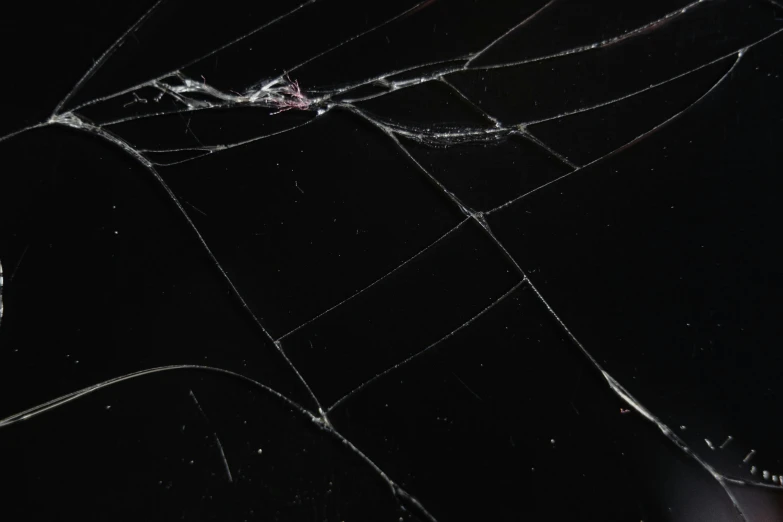 the inside of a web with a dark background