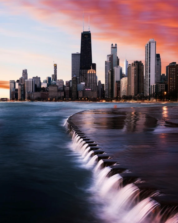 a view of a city skyline with tall buildings in the background