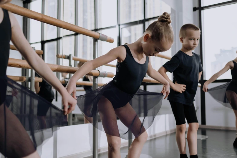 a group of children in a ballet class