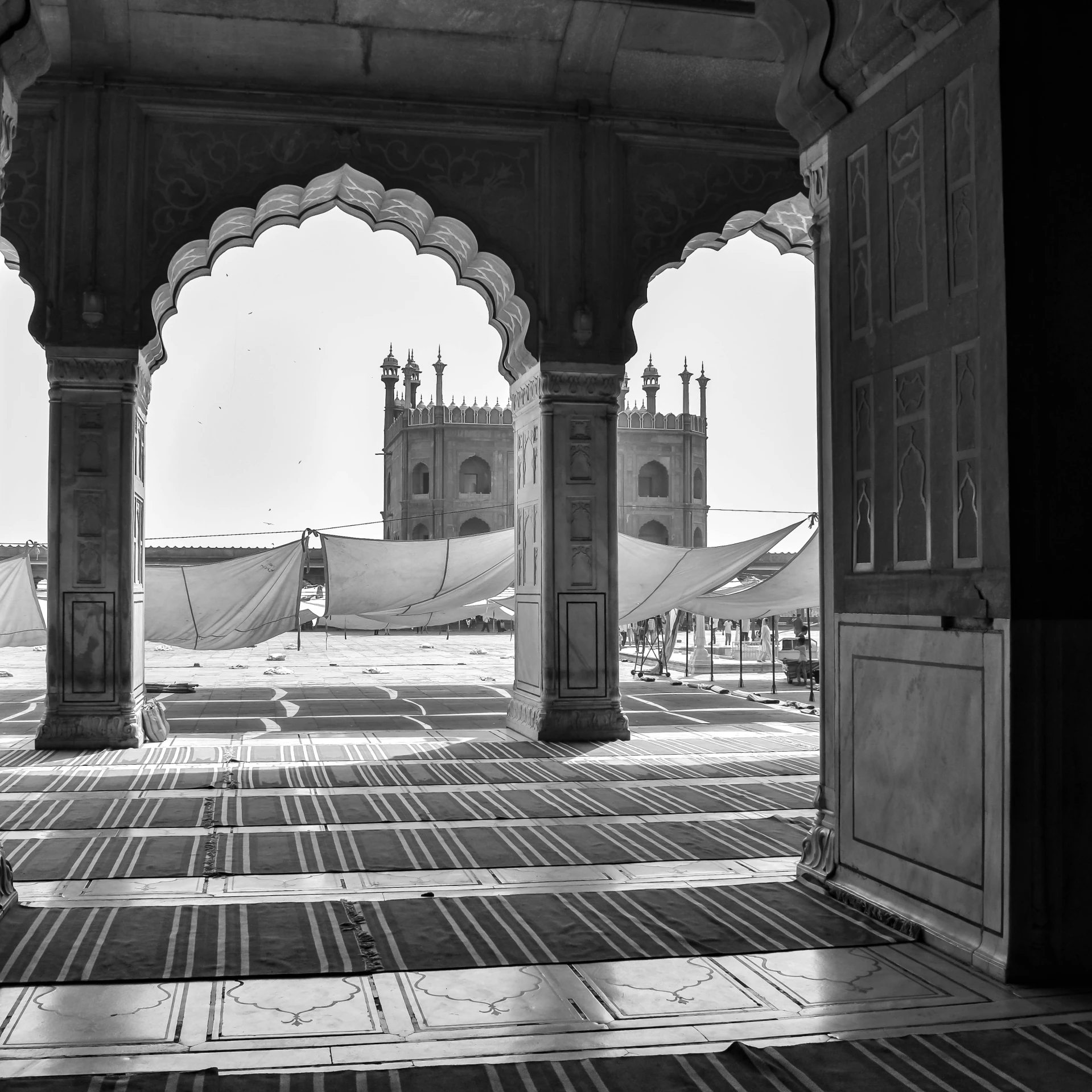 a po taken from inside a building with two arched archways