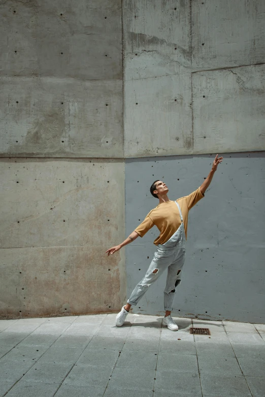 a man riding a skateboard on top of cement