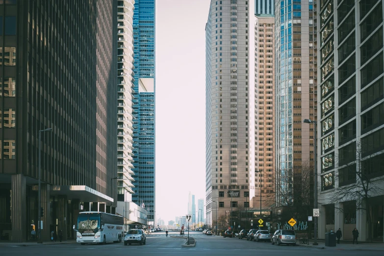 a street lined with tall buildings surrounded by tall buildings