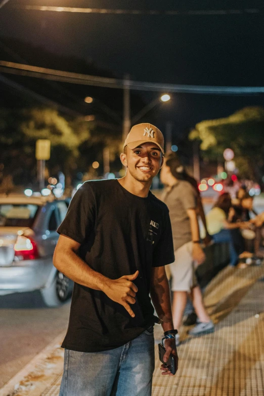 man with a smile on his face walking down the street