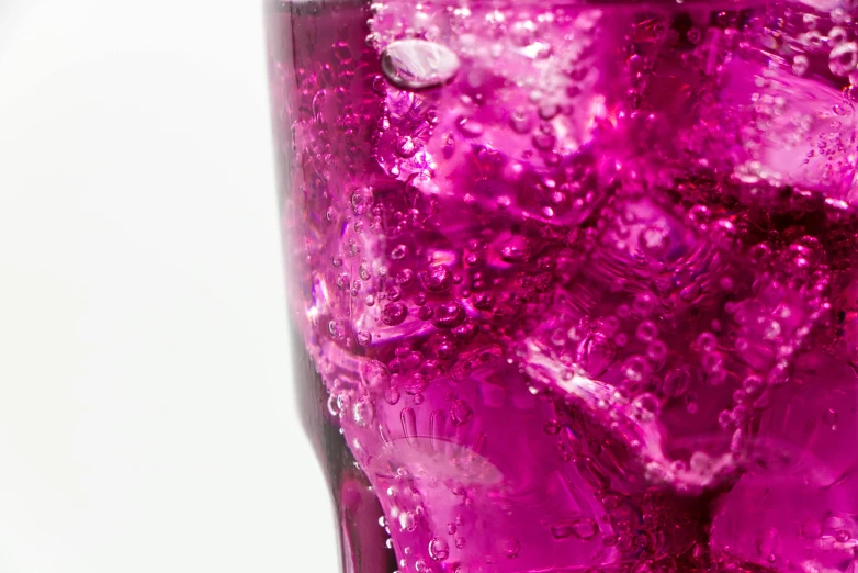 a pitcher filled with ice and liquid