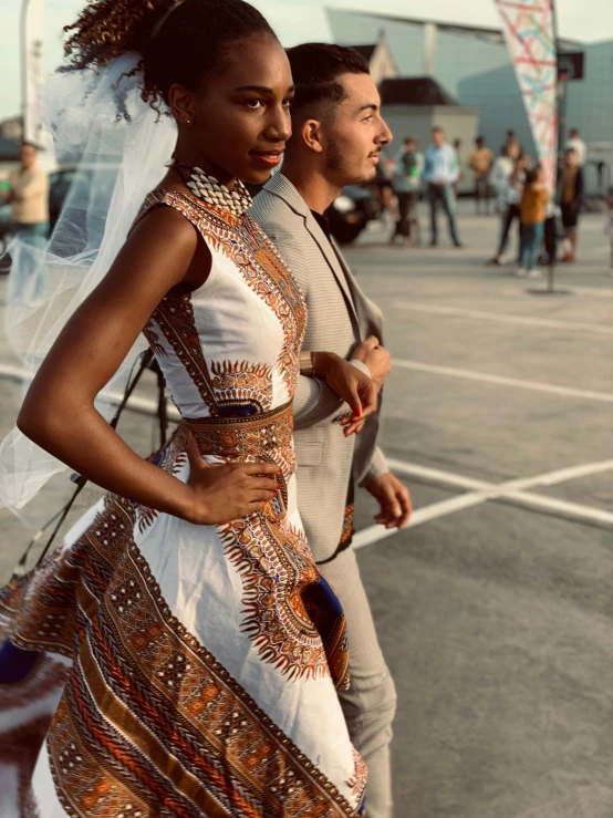 a couple in traditional african dress on their wedding day