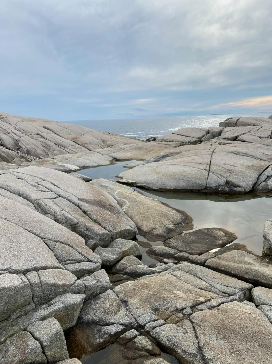 a bunch of rocks in the middle of some water