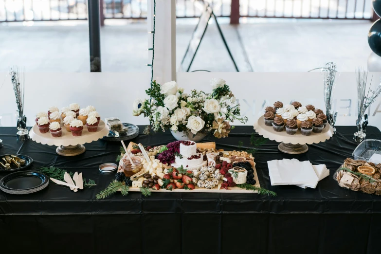 a table with lots of food sitting on top of it