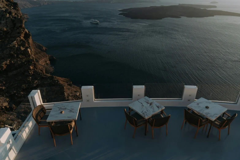 a group of chairs that are near a table