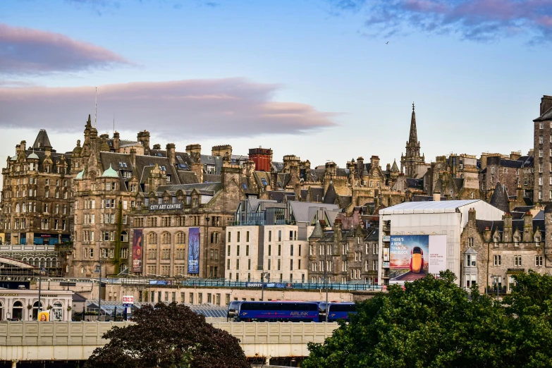 the city of buildings in the foreground is a billboard