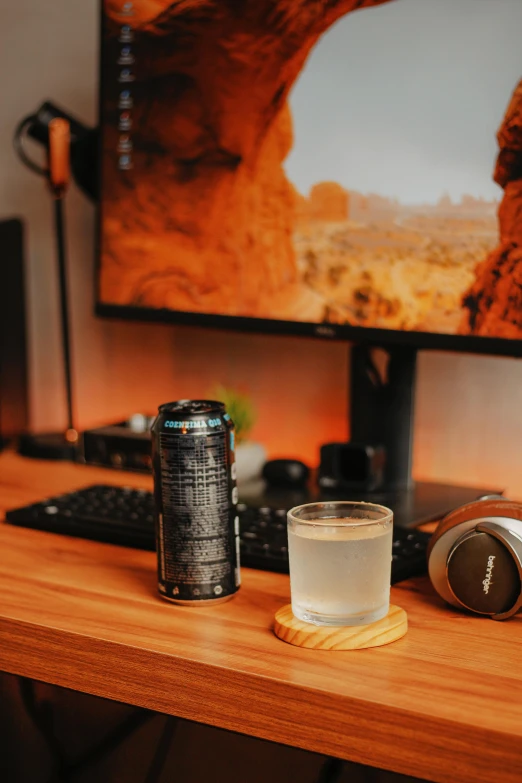 a computer desk topped with a computer keyboard and monitor