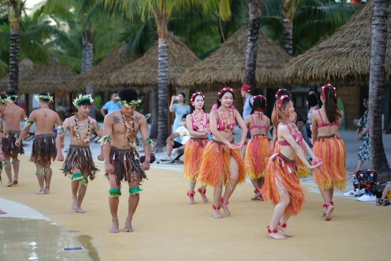 a group of people standing around each other