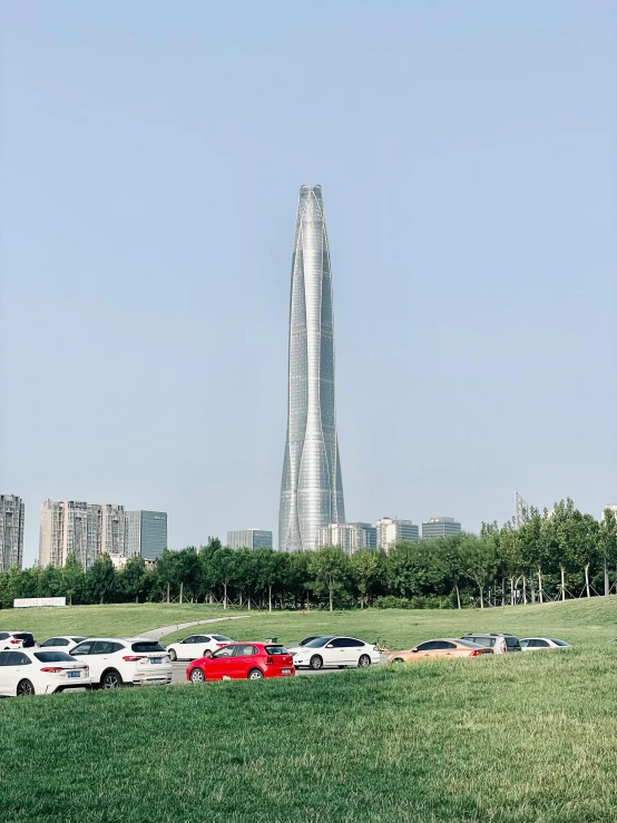 a very tall tower on the side of a field