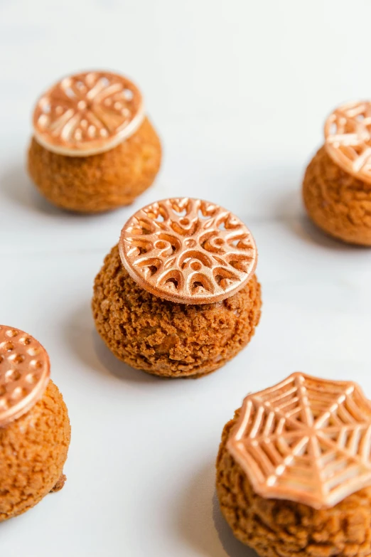 small cookies that are decorated with geometric designs