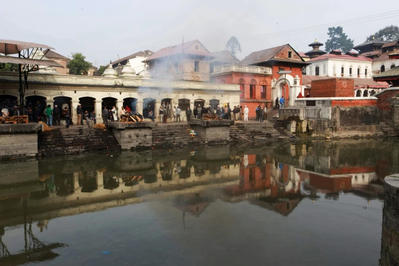 a city river filled with people and water