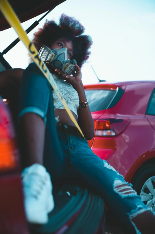 a person talking on a cellphone in a car