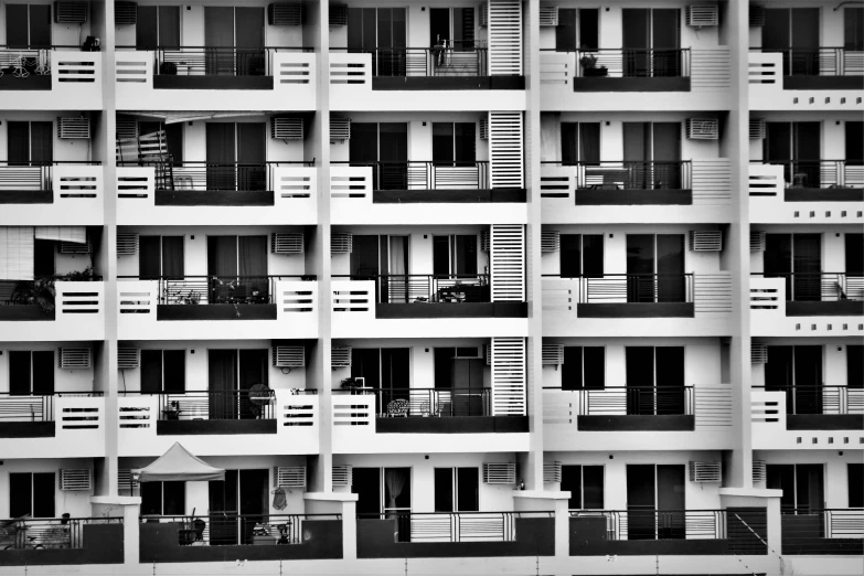 an exterior view of an apartment building with balconies