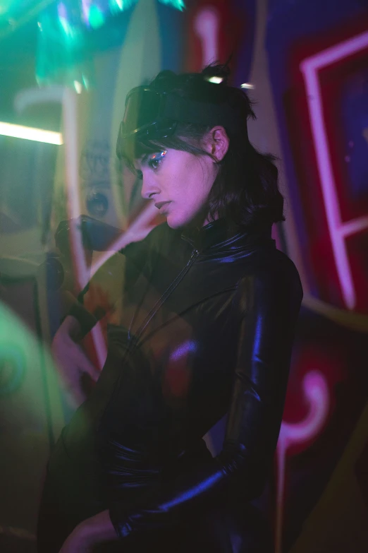 girl in black leather outfit with lights on