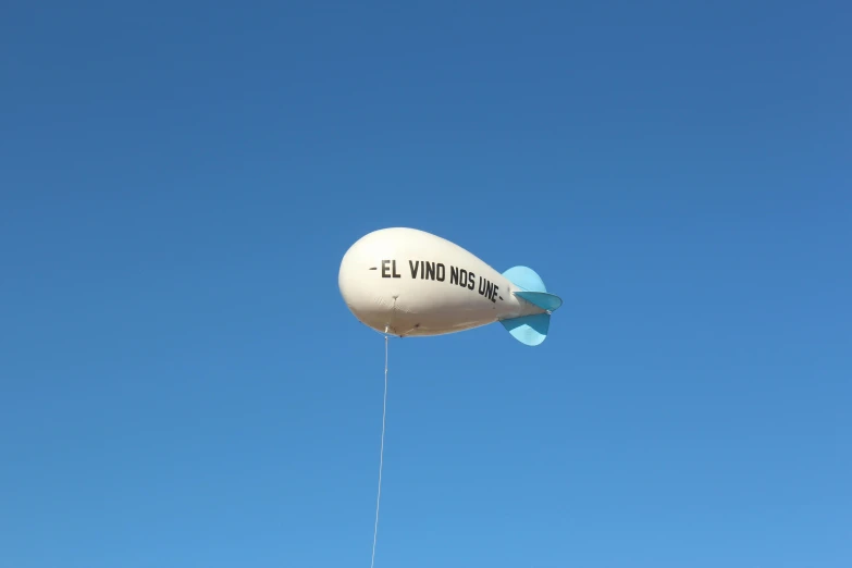 a large white balloon with the words el who should fly