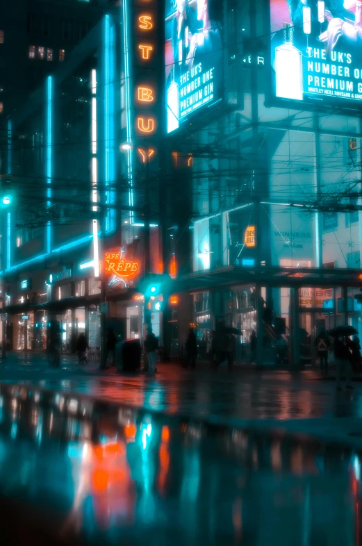 neon lights illuminate a city intersection at night