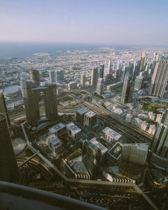 looking down on city skyline with buildings on either side