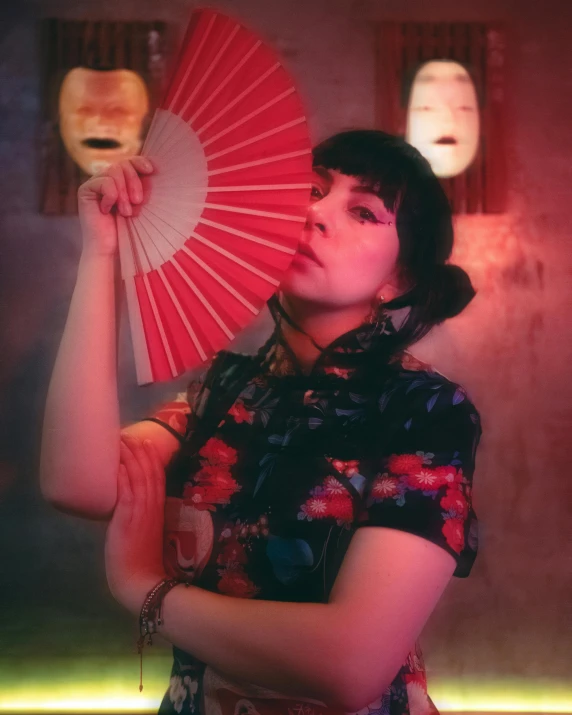 an image of a woman holding a red parasol