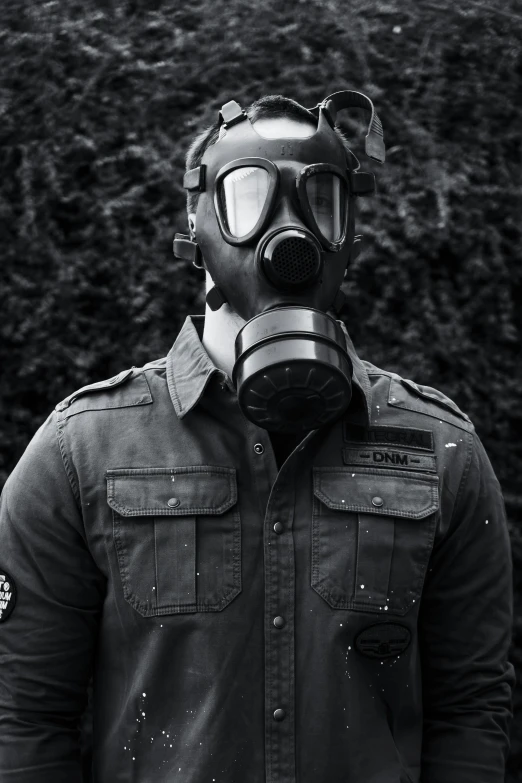 man wearing a gas mask and protective gear