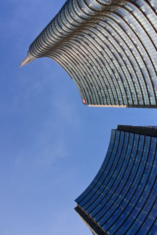 a view of the top floors of a tall building