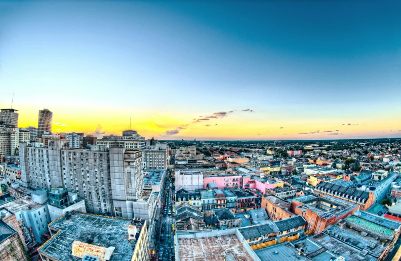 an aerial po of a city with high rise buildings